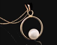 "10K 14K 18K Gold Ring Pearl Necklace, Pearl necklace, Elegant Pearl Necklace, Design Pearl Necklace, Handmade Jewelry * Made to Order * Material: 10K 14K 18K Solid Gold * Pendant height: ( 18 mm ) * Pendant width: ( 16 mm ) * Gold Color: Yellow Rose White Gold * Ready to Ship in 1-3 Business Days * The product includes solid gold chain Chain Length 14 inches adjustable 13 inches 16 inches adjustable 15 inches 18 inches adjustable 17 inches 20 inches adjustable 19 inches 22 inches adjustable 21 Pearl Necklace Designs, Solid Gold Chains, 18k Gold Ring, Pearl Ring, Yellow Roses, Chain Lengths, Gold Pendant, Gold Chains, Charm Necklace