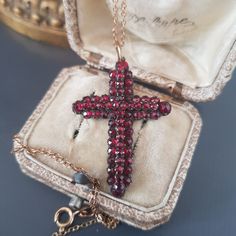 Antique pendant, tombac cross set with old-cut Bohemian garnets.  Beautiful and rare Victorian piece, 19th century European work.  Sold without chain.  Dimensions without bail: approx. 4 x 3 cm / 1,57" x 1,2" Very good antique condition. I'm happy to combine shipping costs if you buy more than one item. Import duties, taxes, and charges are not included in the item price or shipping cost. These charges are the buyer's responsibility. Please check with your country's customs office to determine w Victorian Cross Necklace For Formal Occasion, Victorian Cross Jewelry As Gift, Victorian Cross Jewelry For Gifts, Antique Cross Pendant Necklace For Formal Occasions, Victorian Crucifix Jewelry For Gifts, Antique Hallmarked Cross Pendant Jewelry, Antique Cross Pendant Necklace As Gift, Antique Cross Jewelry For Wedding, Antique Pendant Cross Necklace As Gift