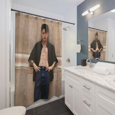 a man is standing in front of a shower curtain with his shirt open, and the image of himself on it