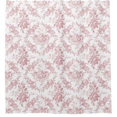 a pink and white shower curtain with floral print on it, in front of a white background