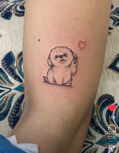 a small dog with a heart on it's leg is shown in this image