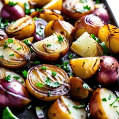 roasted onions with parsley in a baking pan