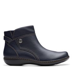 PRICES MAY VARY. Leather upper with stitching details and a brass button Zip closure Ultimate Comfort footbed Non-skid outsole Durable upper Stitching Details, Clarks Women's, Soft Textiles, Tumbling, Slip Ons, Boot Shoes Women, Side Zip, Special Features, Leather Upper