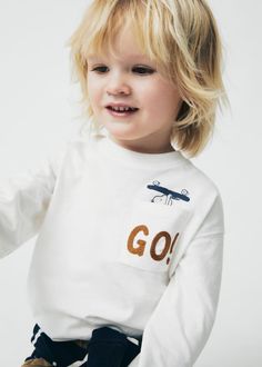 Snoopy long-sleeved t-shirt - Girls | Mango Kids USA White Long Sleeve T-shirt With Embroidered Text, Casual Long Sleeve T-shirt With Embroidered Text, Casual Long Sleeve Tops With Embroidered Text, White Long Sleeve T-shirt With Pockets, Fall Long Sleeve Tops With Embroidered Text, Tropical Print Shirt, Baby Boy T Shirt, Cotton Cargo Pants, Mango Kids