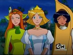 the three princesses are standing next to each other