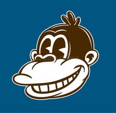 the head of a monkey with a smile on it's face, in brown and white