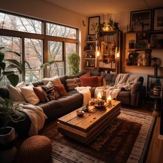 a living room filled with furniture and lots of windows