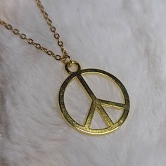 Gold Peace Sign Boho Hippie Charm On A Stainless Steel Chain Necklace Charms Are Approximately 25x21mm. We Also Have A Large Peace Sign And A Tiny Peace Sign Available In Silver! This Comes On Rope Cord, A Chain, Or As Earrings, See Other Listings! Comes On A 16 Inch Stainless Steel Necklace With A Lobster Clasp And 1.5 Inch Extension Chain. Stainless Steel Chain Necklace, Rope Cord, Handmade Gold, Stainless Steel Necklace, Peace Sign, Stainless Steel Chain, Womens Jewelry Necklace, Hippie Boho, Charm Necklace