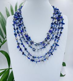 Big bold chunky multi strand handmade necklace. Lapis lazuli  beaded statement jewelry gift for women. You can wear this unique navy blue gemstone jewelry day or evening. Fits perfectly into shirts or summer dresses This necklace can make even an everyday dress stunning. It will be the perfect gift for yourself and a wonderful woman around you. While designing my necklaces, I pay attention to multi-purpose use. It can be used for casual evening or wedding, it's up to you and your choices .  For Bohemian Blue Lapis Lazuli Beaded Necklace, Blue Multi-strand Natural Stone Necklaces, Blue Multi-strand Natural Stone Necklace, Blue Multi-strand Necklace With Natural Stones, Blue Multi-strand Gemstone Beads Jewelry, Blue Multi-strand Jewelry With Gemstone Beads, Bohemian Blue Crystal Necklace With Gemstone Beads, Unique Blue Crystal Necklaces With Natural Stones, Handmade Blue Long Crystal Necklace