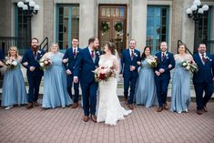 a bride and groom with their bridal party