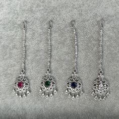 Handmade Style: Tikka Headpiece Material: Platinum Plated, Lab Simulated Ruby and White Sapphire Stones Imported Item Number: 7087 Tikka Headpiece, Sapphire Stones, Sapphire Stone, Handmade Fashion, White Sapphire, Item Number, Headpiece, Platinum, Ruby