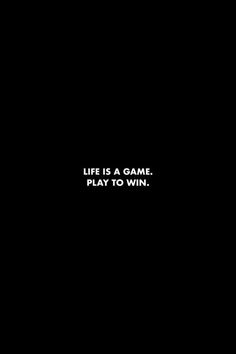 the words life is a game play to win on a black background