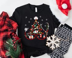 a black shirt with the word nurse on it next to christmas decorations and other items