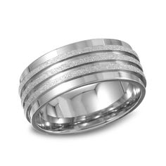 Wow him with a look that pairs texture and dimension in one fabulous look. Fashioned in sleek stainless steel, this ring features a diamond-cut and textured center band with grooved detailing. Polished bands border this center stripe, giving this 6.0mm wide band sophisticated appeal. Polished to a brilliant shine, this ring makes a stylish wedding band for him. Custom made to fit his ring size. Stainless steel rings cannot be resized after purchase. Wedding Band For Him, His Ring, Wedding Bands For Him, Stylish Wedding, Size 10 Rings, Stainless Steel Rings, Steel Ring, Wide Bands, Steel Metal