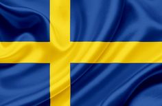 the flag of sweden is waving in the wind and it looks to be very colorful