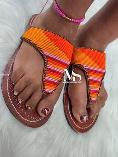 100% handmade using leather and fine beads. Masai beaded sandals are made using the pure original leather and quality African beads.They are inspired by the Masai community They are perfect for any occasion. True to size. We ship worldwide. Feel free to send me a convo for any clarifications Beaded Leather Sandals, Beaded Shoes, Leather Sandals Handmade, Shoes Photo, Beaded Sandals, Sandals Slippers, Maasai, African Beads, African Jewelry