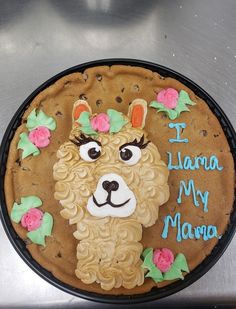 a cake decorated with an image of a llama