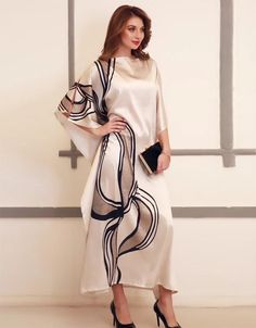 ✨ Step into luxury with our Cream Soft Satin Silk Gown! 💃✨ Elevate your fashion game with this exquisite piece.! 💖 https://www.arabicattire.com/products/cream-soft-satin-silk-gown-jsdc-7017 #ArabicAttire #SatinSensation #FashionFaves #GownGoals #ElegantElegance Silk Kaftan Dress, Kaftan For Women, Modest Evening Dress, Kaftan Designs, Woman Suit Fashion, Designer Dresses Casual, Fancy Dress Design, Silk Gown, Caftan Dress