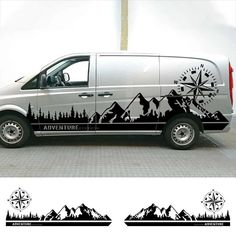 a van with mountains and trees painted on it