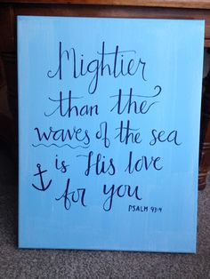 a blue sign that says, nightier than the waves of the sea is his love for you