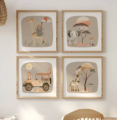 three framed pictures hang on the wall above a crib in a child's room