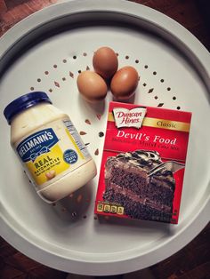 eggs, milk, and cake on a white plate