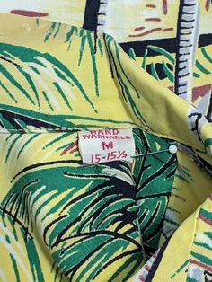 For your consideration, this ORIGINAL 1950s Duke Kahanamoku Hawaiian Shirt. This fine garment IS NOT A REPRODUCTION, but an authentic, handmade piece of 1950s Hawaiiana. Bask in the luxurious aura of this fine shirt for years to come, you've earned it! A Note to our customers: Many of you are here knowing exactly what you're looking for...well we've got it! For the uninitiated, please read on and enjoy your jounrney into the exciting world of vintage Hawaiian shirts: What makes vintage Hawaiian Retro Yellow Shirt For Vacation, Vintage Long Sleeve Hawaiian Shirt For Vacation, Vintage Print Camp Shirt For Summer, Vintage Hawaiian Shirt For Vacation, Vintage Hawaiian Shirt With Camp Collar For Beach, Vintage Cotton Hawaiian Shirt For Vacation, Vintage Camp Collar Top For Vacation, Vintage Printed Hawaiian Shirt For Vacation, Vintage Hawaiian Shirt For Summer