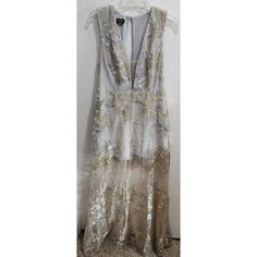 Bebe Women's Formal Maxi Illusion Dress Gold/Silver Floral Embroidered Sz Medium Silver Floor-length Dress For Festive Occasion, Silver Festive Floor-length Dress, Silver Floral Embroidered Wedding Dress, Silver Floral Embroidery Wedding Dress, Fitted Silver Embroidered Dress, Fitted Embroidered Silver Dress, Silver Embroidered Dress For Festive Season, Silver Embroidered Festive Dress, Festive Silver Embroidered Dress