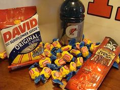 candy bar and bag of chips sitting on a table