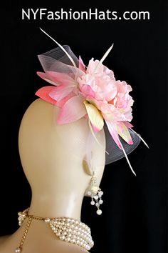 Women’s Pink Sinamay Straw Large Flower Feather Bow Fashion Designer Haute Couture Hat Headpiece Wedding Fascinator Hair Accessory. A Large Pastel Pink Horsehair Crinoline Bow Is Placed On A Simulated Pink Sinamay Straw Round Base, Accented With A Large Vintage Ivory Yellow And Pink Handmade Silk Flower, Embellished With White Goose Biot Feathers. This Formal Art Deco Styled 1920’s Style Flapper Hat Wedding Headpiece Can Be Worn In Different Positions. This ladies bespoke couture formal designer wedding fascinator hat is appropriate to wear for horse races, The Kentucky Derby, The Dubai World Cup, The Royal Ascot, The Melbourne Cup, Belmont Stakes, The Preakness Stakes horse racing, Church, weddings, and special occasion. This lovely Spring and Summer fascinator is also suited for mother o Summer Wedding Fascinator With Flower Decoration, Summer Wedding Fascinator With Feathers, Summer Wedding Headpiece With Feathers, Summer Wedding Flower Headpiece, Summer Wedding Flower Hair Accessories, Summer Wedding Floral Headpiece, Feather Hair Accessories For Wedding And Kentucky Derby, Feathered Mini Hat Headband For Weddings, Feathered Hair Accessories For Wedding At Kentucky Derby