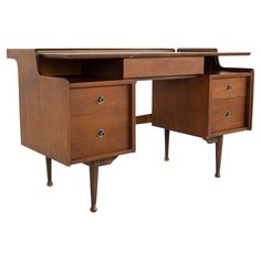 a wooden desk with two drawers on one side and an open drawer on the other