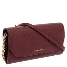 New With Original Store Tags Cards And Dust Bag. Made From Burgundy Leather, This Henley Wallet On Chain From Burberry Is A Must-Have! The Leather-Fabric Lined Interior Holds Multiple Card Slots, A Zipper Pocket, And Slip Compartments For All Your Essentials. Get This Stylish And Elegant Creation Now. Gender Women Includes Original Dustbag, Brand Tag Exterior Material Leather Interior Material Leather And Fabric Length 21 Cm Width 3 Cm Height 11 Cm Shoulder Strap 54 Cm Hardware Gold Tone Origin Burgundy Crossbody Bag, Brand Tags, Leather Interior, Burberry Bag, Leather Fabric, Zipper Pocket, Luxury Bags, Burberry, Dust Bag