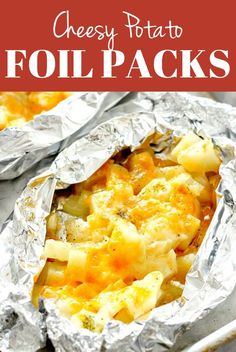 baked potatoes in foil with text overlay that reads cheesy potatoes foil packs recipe for breakfast