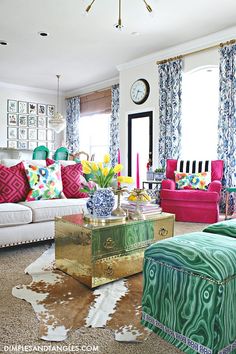 a living room filled with lots of colorful furniture