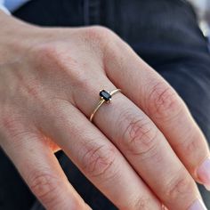 💎Elevate your style with our 14K Gold Black Onyx Ring. This stunning Vertical Solitaire Black Gemstone Gold Ring features a Baguette Octogon Cut Dark Stone that exudes elegance. The perfect Dainty Best Friend Gift, this ring is a timeless statement piece. Crafted with care and precision, it's designed to complement any outfit and make you shine. 💎 F E A T U R E S ▸ Made to Order ▸ Custom Gold Color: Yellow Gold, Rose Gold, White Gold ▸ Band Width: 1.30mm / 0.04in ▸ Material: Solid Real Gold (n Classic Black Baguette Cut Rings, Modern Black Sapphire Ring, Black Fine Jewelry Rings For Everyday, Everyday Black Fine Jewelry Ring, Everyday Fine Black Ring, Minimalist Black Sapphire Ring For Gift, Minimalist Black Sapphire Ring As Gift, Minimalist Black Emerald Cut Jewelry, Black Sapphire Ring In 14k Gold As Gift