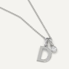 A personalized initial necklace design featuring a letter D pendant. This beautiful women's letter necklace is approx. 1cm tall and comes in solid 14k white or yellow gold with an optional 0.05 carat (3mm) diamond and an adjustable 16 inch - 18 inch chain. Classic Diamond Initial Necklace, Classic White Gold Monogram Initial Necklace, Classic White Gold Charm Necklace With Initials, White Gold Initial Necklace With Diamond For Anniversary, Anniversary White Gold Initial Necklace With Single Diamond, Diamond Initial Pendant Necklace In White Gold, Luxury Initial Pendant Necklace In Sterling Silver, Elegant Diamond Initials Charm Necklace, White Gold Diamond Initial Pendant Necklace