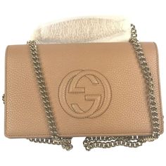 This Gucci Soho Wallet With Removable Chain In Camel Has A Textured Leather Exterior And Gold Snap Closure. It Features The Classic Gucci Gg Soho Logo On Front. Also Includes A Detachable Gold Chain Strap 22" Drop. Gucci Soho Wallet With Removable Chain In Camel Front Slip Pocket Interior Zipper Pocket 6 Card Slots Detachable Gold Chain Strap With 22" Drop Full Length Open Compartment With Slip Pocket Measurements: 8" L X 5" H X 2" D Product Number 598211 Made In Italy Gucci Leather Wallet On Chain, Gucci Leather Wallet On Chain For Everyday Use, Gucci Gold Wallet On Chain With Gold-tone Hardware, Designer Gucci Leather Wallet On Chain, Gucci Gold Wallet On Chain For Everyday Use, Gucci Leather Wallet On Chain For Formal Occasions, Gucci Leather Wallet On Chain For Formal Use, Designer Brown Wallet On Chain With Chain Strap, Chic Gucci Gold Wallet On Chain