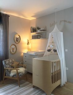 a baby's room is decorated in neutral colors