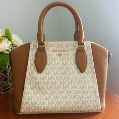 Michael Kors Signature Sienna Messenger Bag. Color Is Acorn/Vanilla, Retails For $278. Great Deal With Price!!! No Flaws And Still Has Tag Attached. Love This Purse I Just Want Something Bigger To Fit My Laptop In This Summer! Michael Kors Beige Shoulder Bag With Detachable Handle, Michael Kors Cream Shoulder Bag With Detachable Handle, Luxury Michael Kors Beige Satchel, Luxury Beige Michael Kors Satchel, Michael Kors Cream Bag With Detachable Handle, Michael Kors Beige Rectangular Satchel, Michael Kors Cream Top Handle Shoulder Bag, Michael Kors Beige Satchel With Detachable Handle, Michael Kors Beige Top Handle Shoulder Bag