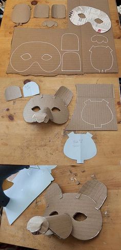 paper cut out shapes on a wooden table