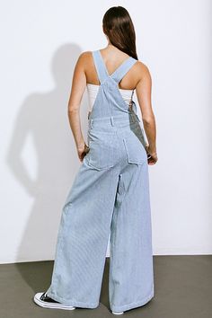 A sophisticated denim jumpsuit adorned with adjustable straps, a front center pocket, side button closure, pleated pants, back pockets, and wide legs.Details:Self : 100% CottonSize & Fit- Model is 5`8" And Wearing Size Small- Measurements Taken From Size Small- Approx. Length: 59" Dance With You, Pleated Pants, Wide Legs, Denim Jumpsuit, Trinidad And Tobago, Brunei, Fitness Models, Dancing, Adjustable Straps