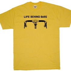 Life Behind Bars Bicycle T SHIRT Racing Strong by Shirtmandude Short Sleeve Graphic Print Cycling Tops, Graphic Print Short Sleeve Cycling Top, Graphic Print Short Sleeve Tops For Cycling, Short Sleeve Cycling T-shirt With Letter Print, Cycling Studio, Black Mountain Nc, Life Behind Bars, Men Cycling, Hilarious Humor