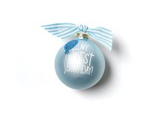 a blue ornament with a bird on it that says, my first birthday