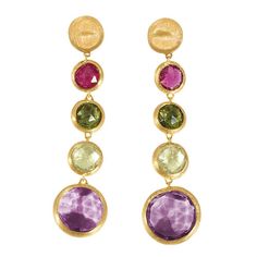 Bezel-set faceted multi-colored gemstones are joined together to bring gorgeous, unadulterated color to these dangle drop earrings in the beautiful Jaipur collection. Be bold and fashionable with these colorful earrings. These earrings mix and match perfectly with other pieces in this collection. Gems include Amethyst, Citrine, Garnets, Blue Topaz, Quartz NAGI Jewelers is an Authorized Marco Bicego Retailer. 18K Yellow Gold Posts & push backs Actual Stones May Vary slightly in tone and hue A Luxury Modern Gemstone Earrings, Luxury Modern Multicolor Gemstones, Luxury 22k Gold Gemstone Earrings, Luxury Gemstone Accent Earrings, Luxury Gold-plated Multi-stone Earrings, Gemstone Earrings Dangle, Stone Drop Earrings, Black Earrings Dangle, Marco Bicego