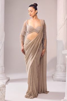 Cuban sand gold saree with metallic stripe pattern. Paired with pearl, crystal, cutdana embroidered blouse. - Aza Fashions Pearl Saree, Tassel Sleeves, Gold Saree, Pearl Crystal, Sweetheart Neck, Embroidered Blouse, Gold Pearl, Aza Fashion, Stripes Pattern