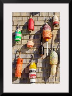 there are many buoys hanging on the wall