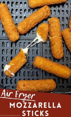 some fried food is being cooked on a grill with a spatula and sauce in it