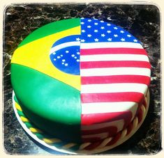 a cake with two flags on top of it