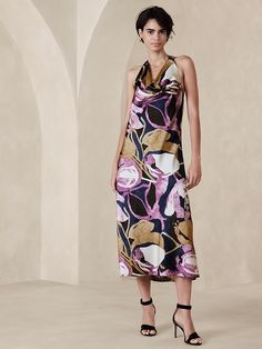 Satin Halter-Neck Midi Dress | Banana Republic Factory Elegant Backless Halter Dress With Floral Print, Chic Floral Print Sleeveless Halter Neck Dress, Chic Sleeveless Halter Neck Dress With Floral Print, Chic Halter Neck Sleeveless Dress With Floral Print, Elegant Sleeveless Floral Print Halter Dress, Chic Halter Dress With Floral Print For Evening, Halter Neck Midi Dress With Floral Print, Floral Print Halter Neck Midi Dress For Date Night, Halter Neck Midi Dress For Date Night