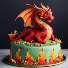 a cake with a red dragon on top